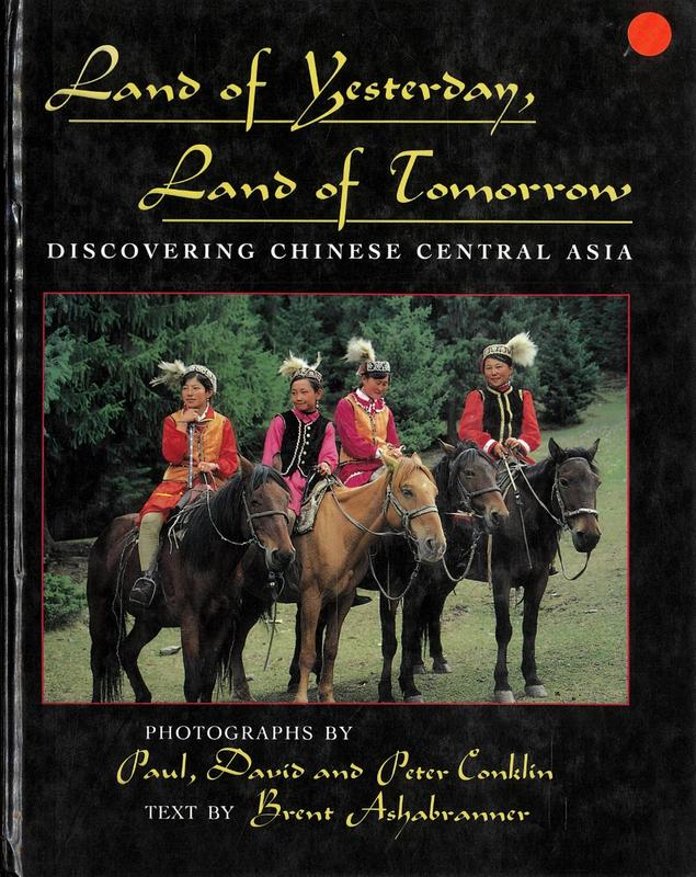 Land of yesterday, land of tomorrow : discovering Chinese Central Asia / Photographs by Paul, David and Peter Conklin ; text by Brent Ashabranner cover