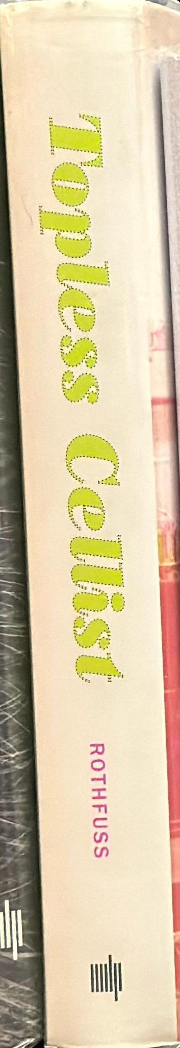 Topless cellist : the improbable life of Charlotte Moorman / Joan Rothfuss ; foreword by Yoko Ono spine