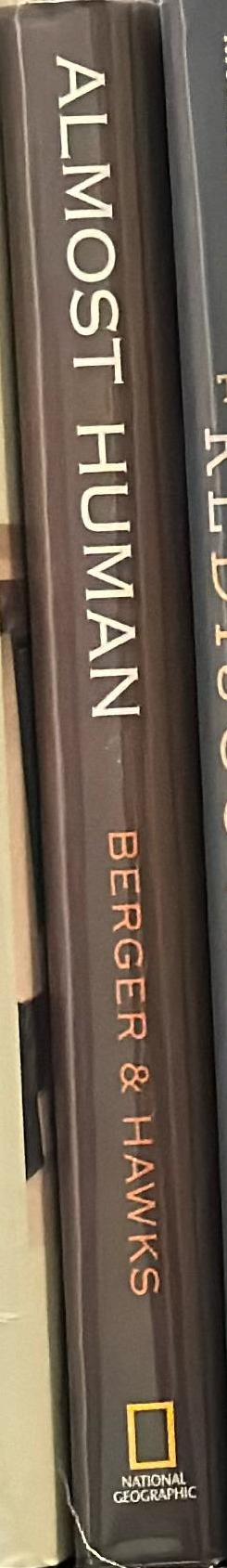 Almost human : the astonishing tale of Homo naledi and the discovery that changed our human story / Lee Berger and John Hawks spine