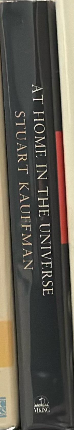 At home in the universe : the search for laws of self-organization and complexity / Stuart Kauffman spine