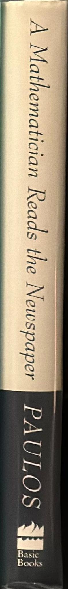 A mathematician reads the newspaper spine