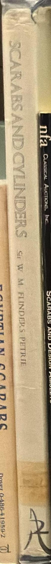 Scarabs and cylinders with names spine