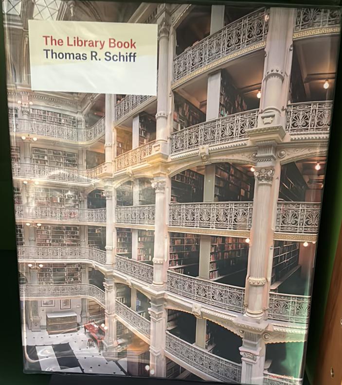 The library book / photographs and afterword by Thomas R. Schiff ; introduction by Alberto Manguel live cover