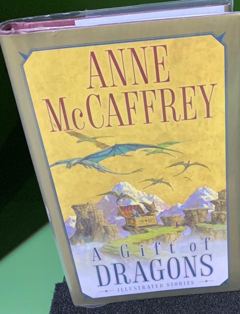 A gift of dragons live cover