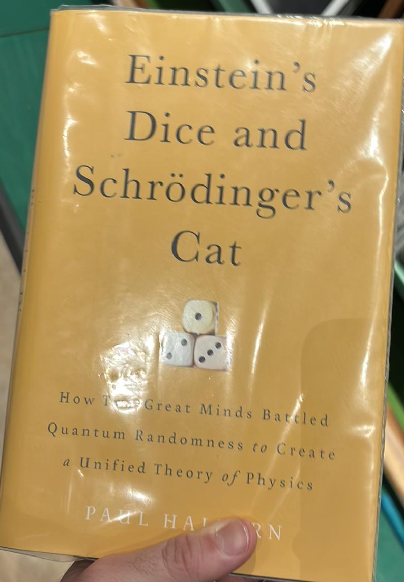 Einstein's dice and Schrodinger's cat : how two great minds battled quantum randomness to create a unified theory of physics / Paul Halpern, PhD live cover