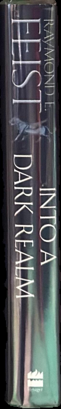 Into a dark realm / Raymond E. Feist live spine