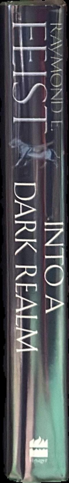 Into a dark realm / Raymond E. Feist live spine