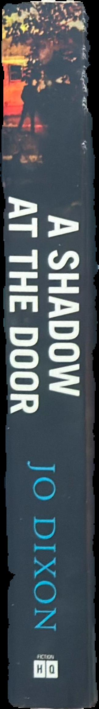 A shadow at the door live spine
