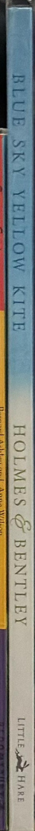 Blue sky yellow kite spine