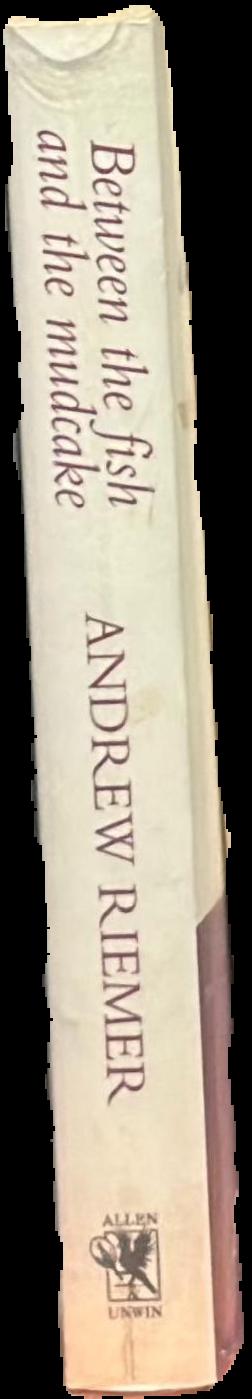 Between the fish and the mudcake / Andrew Riemer spine