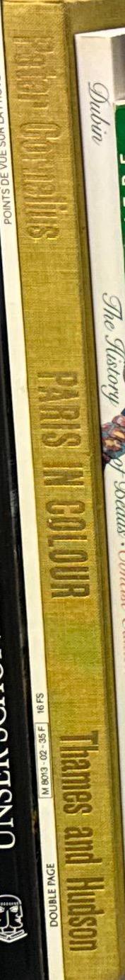 Paris in colour / introduced by Jaques Prévert ; with 109 photographs in colour by Peter Cornelius spine