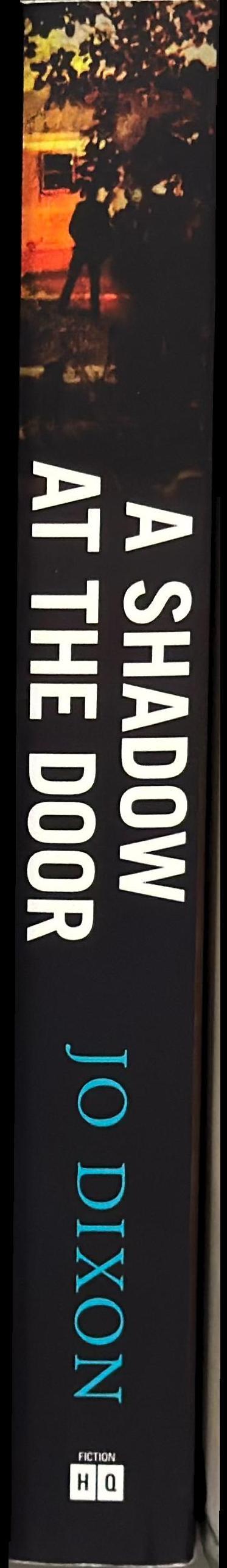 A shadow at the door spine